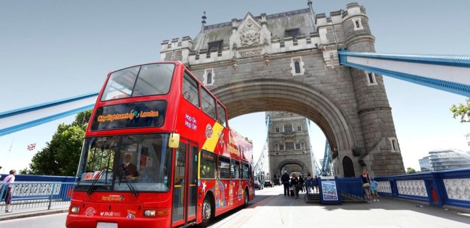 City Sightseeing bus crossing Tower Bridge in London