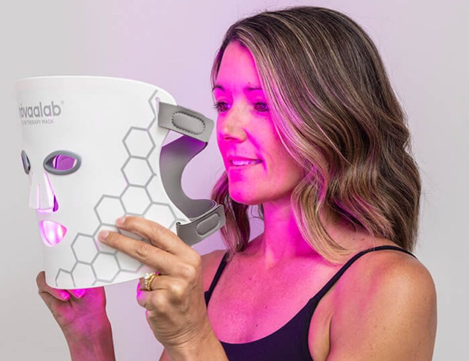 Person using a NOVAALAB LLC glow therapy mask