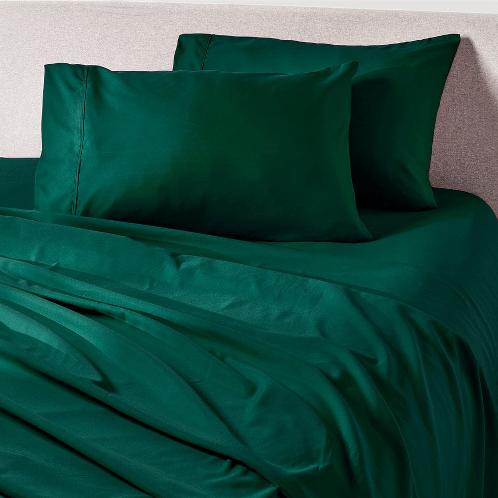 Emerald Green sheet set styled in a bedroom