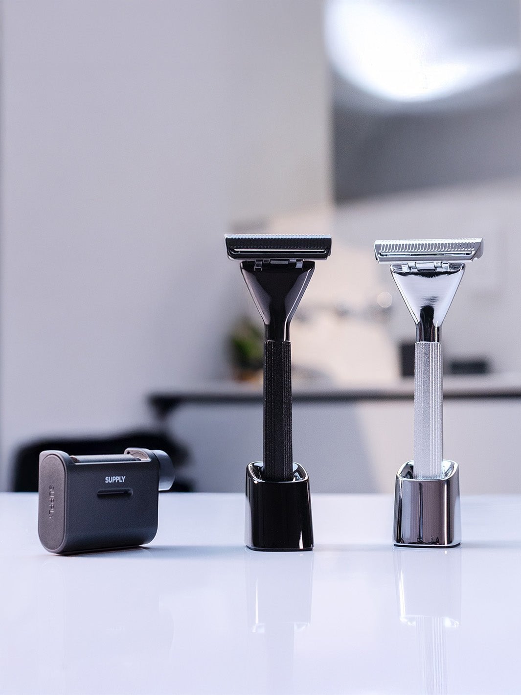 Two Supply Single Edge Max razors and a cartridge on a clean product background