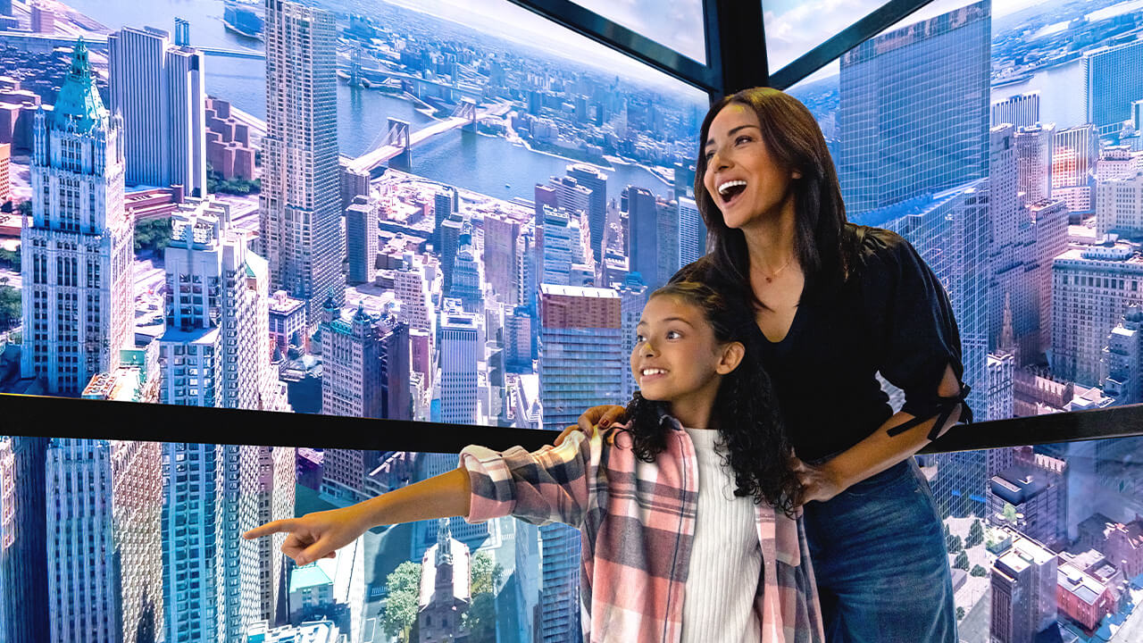Visitors looking out across New York from One World Observatory