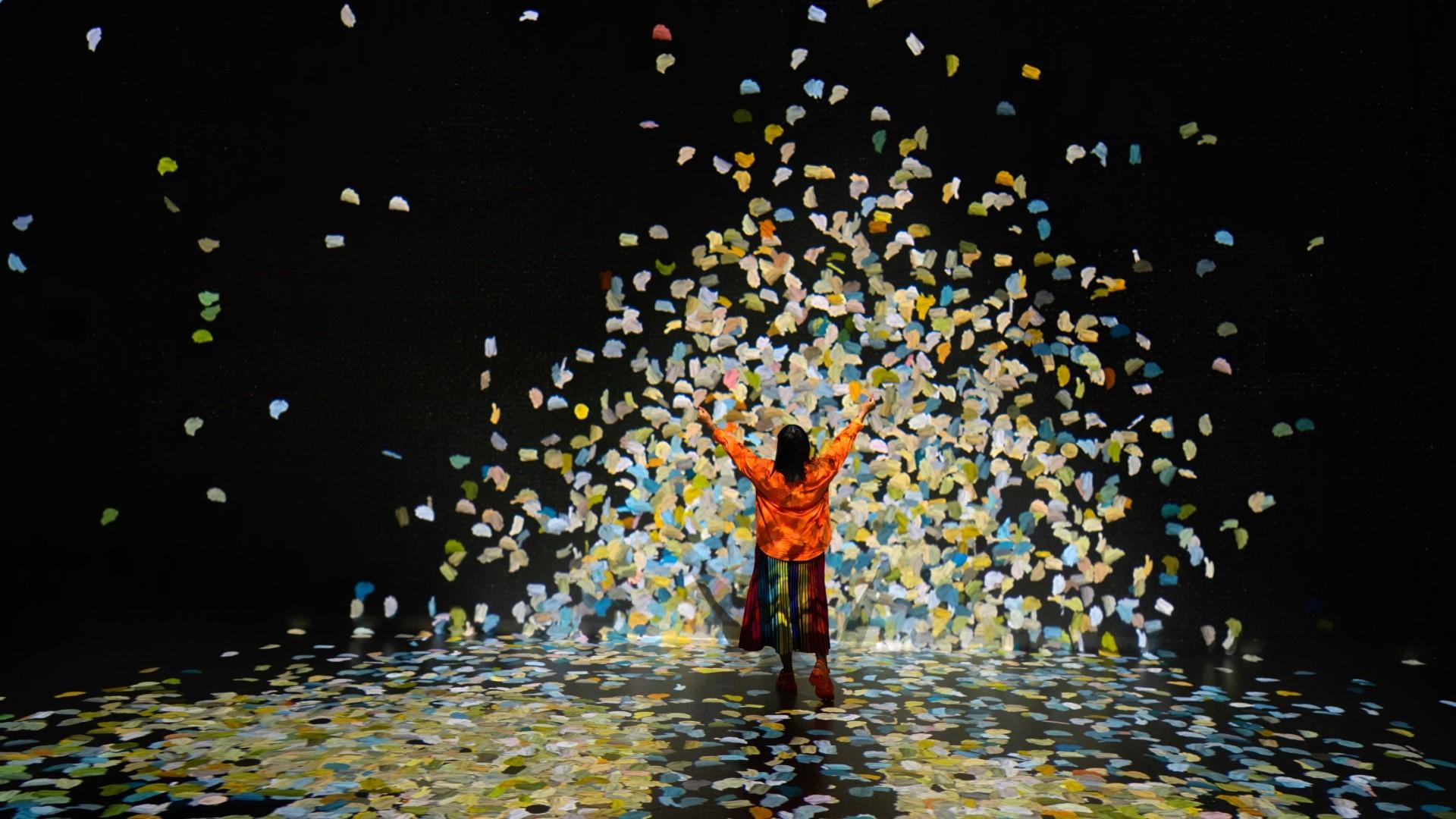 Colourful moving projections fill a Frameless gallery