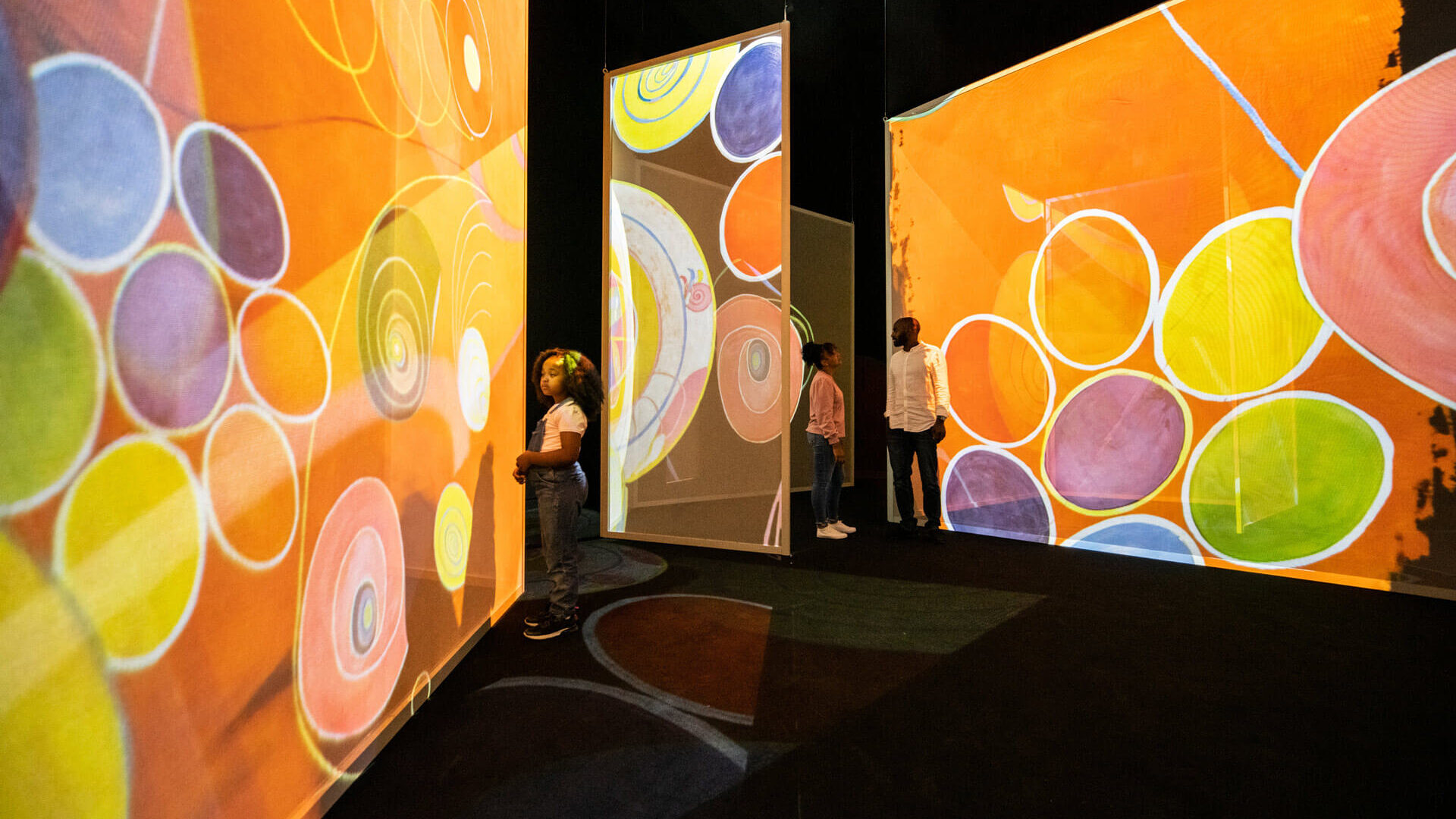 Klint artwork projected across an immersive gallery