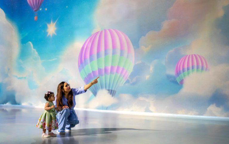 A colourful projected artwork inside Frameless