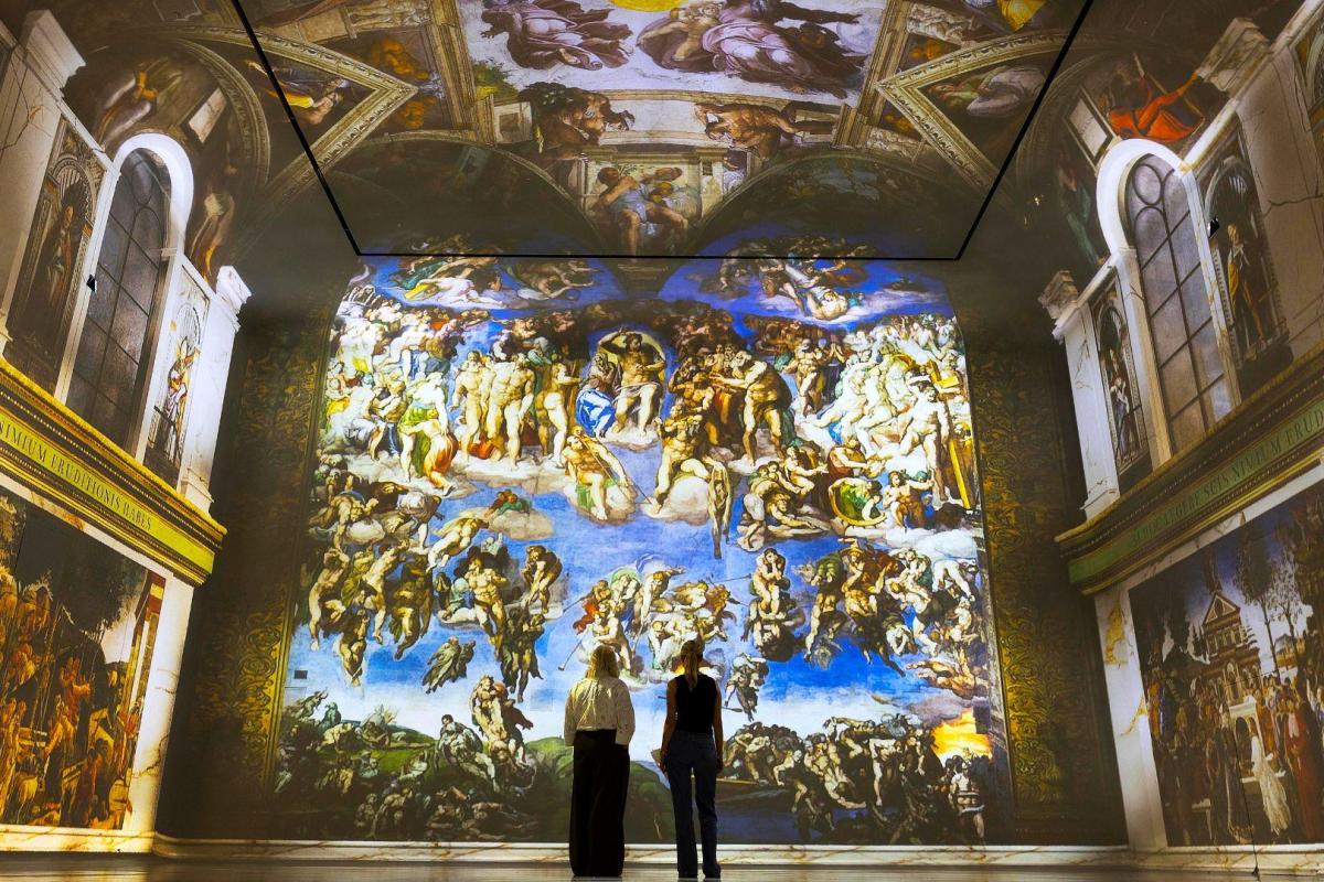 Sistine Chapel imagery shown inside a projection-led room
