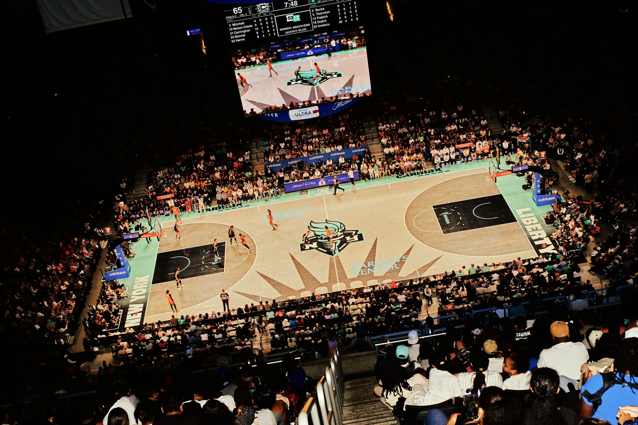 New York Liberty basketball court with fans in the stands
