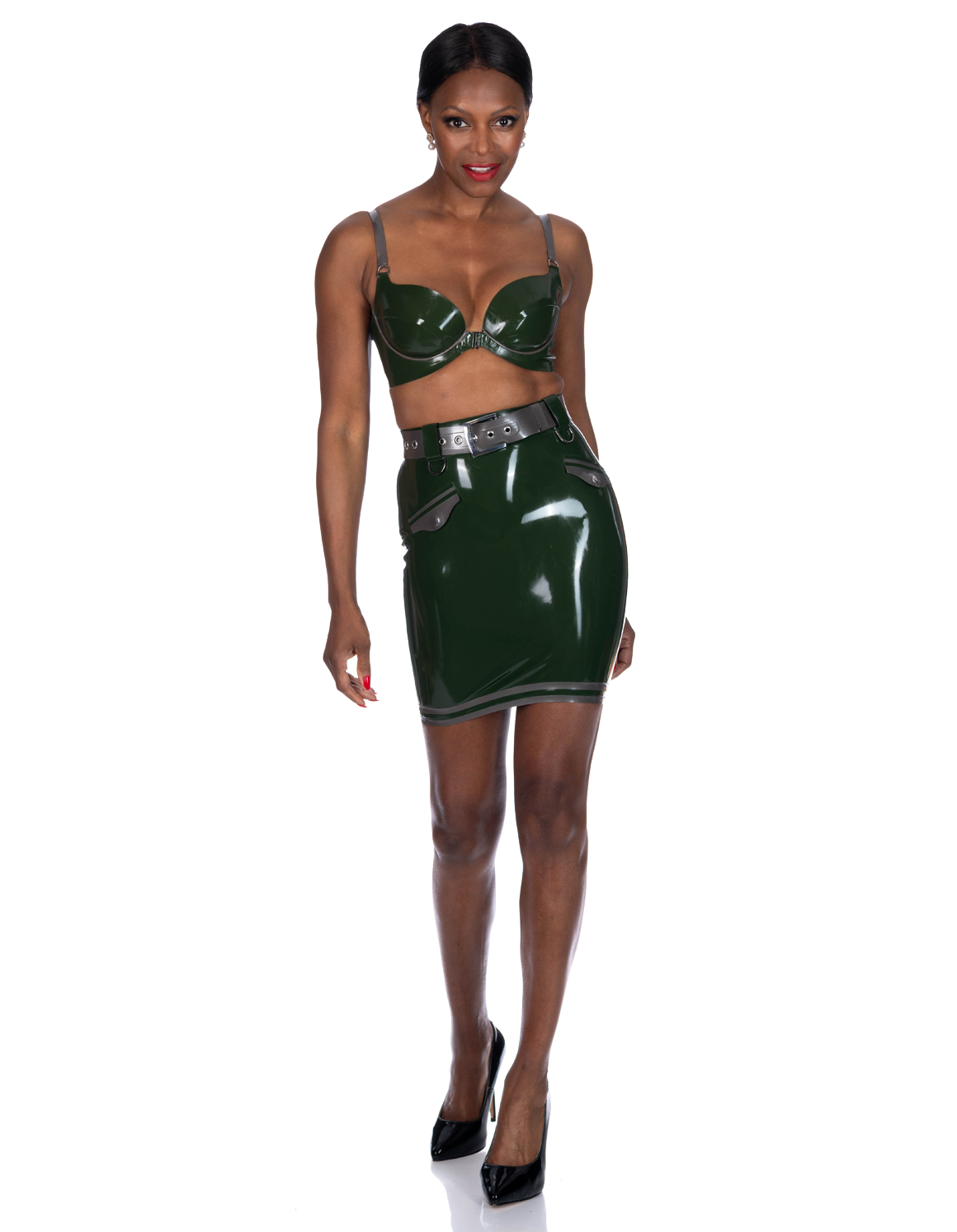 Model wearing an olive green latex bra and matching skirt