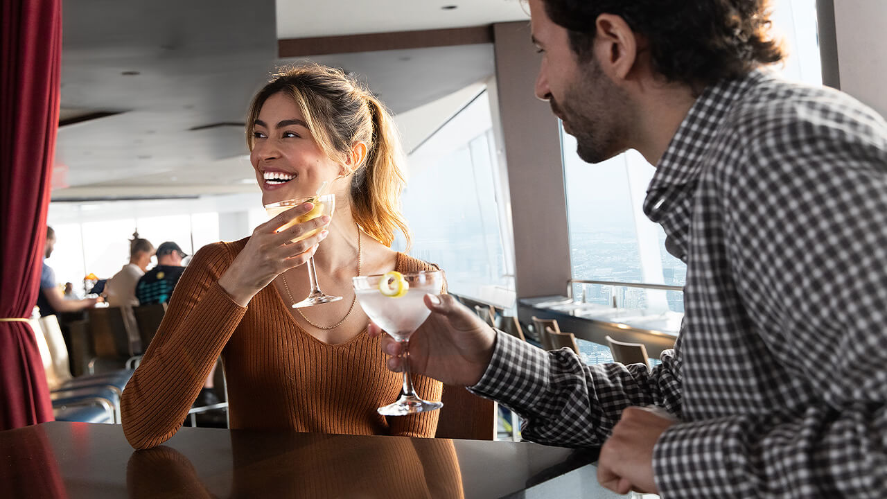 Guests enjoying cocktails at One Mix