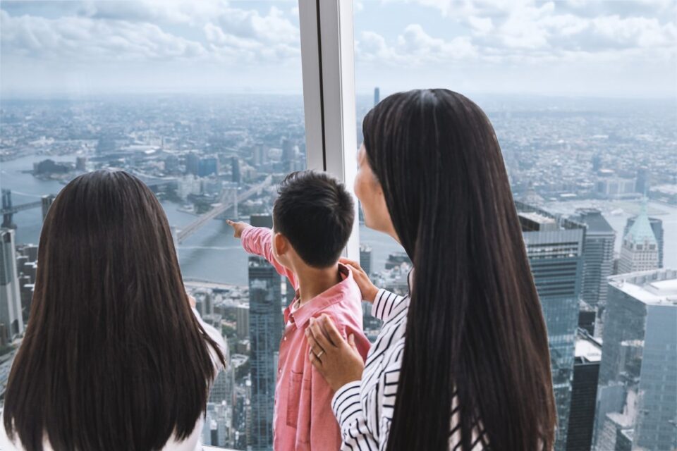 A family taking in the view from One World Observatory