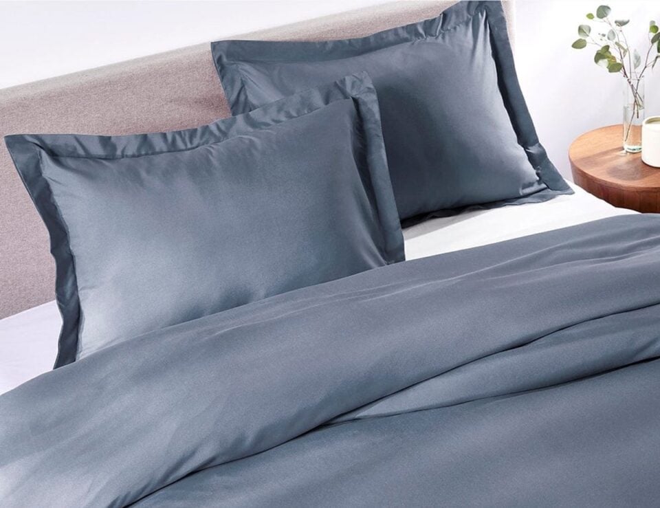 French Blue duvet cover styled on a bed in a bedroom