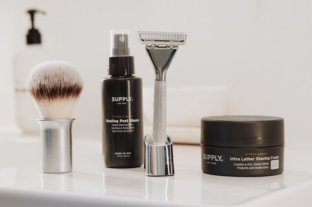 Supply shaving products arranged on a bathroom counter