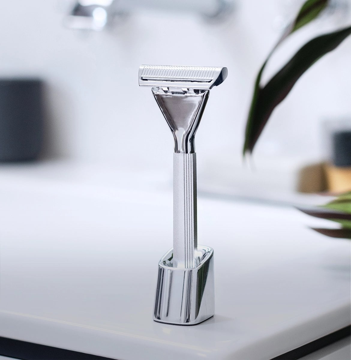 Supply Single Edge MAX razor resting on its stand