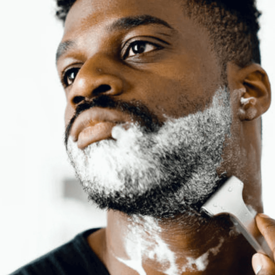 A man shaving with the Supply Single Edge SE razor