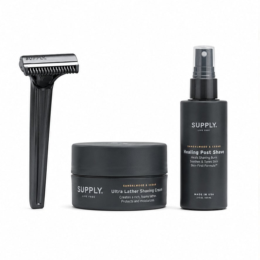 Supply razor, shaving cream and aftershave arranged together