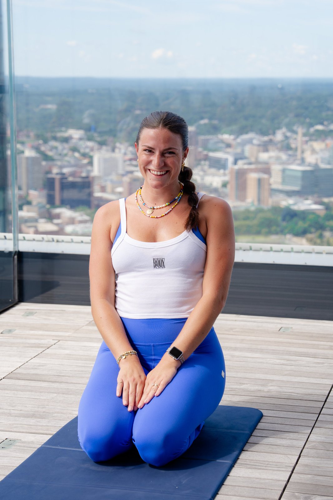 Woman seated on the View Boston observation deck